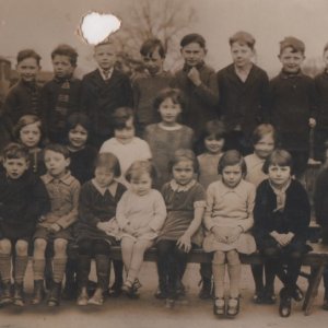 Back row: Percy Lyons, John Foster, Owen Braithwaite, Norman Todds, Percy Watson, Lawrence Foster, Reg Peart, Wilf Maddison, Joe Nicholson, Miss Lucy Sylvester.
Middle row: ?, ?, ?, Rose Lovatt, Margaret West, Myra West, Frank Mawer.
Front row: Raymond Johnson, ?Craggs, Gordon Evison, Lily Bratten, Jean Lyons, Margaret Patrick, Ethel West, ?, Freddie Dishman