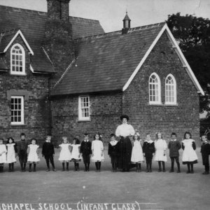 This photograph probably dates round about the same time as the previous one i.e. early 1900s.
The Infant Class contained 26 pupils looking at this photograph.