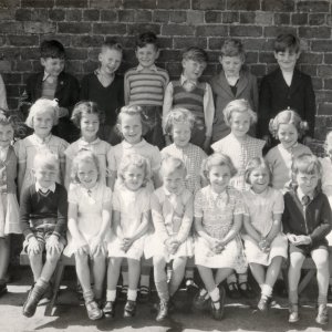 Marshchapel Primary School - probably mid 1950s
Back row: Miss Daphne Campion - Infant Teacher - later to become Mrs Knight, Unknown, Geoff Worrell, John Pepper, Unknown, Geoff Bartholomew, Unknown.
Middle row: Michael Cheese, Unknown, Judy Maguire, Jill Smith, Tina Elvidge, Janice Lovett, Linda Lovett, Pat Portus, Unknown, Gordon Horry.
Front row: Unknown, Unknown, Kay Leak, Unknown, Geraldine Ward, Unknown, Unknown.