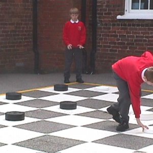 Playground games.  Giant draughts.