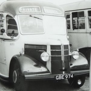 This photograph is of the Red Bus which, together with Applebys (fomerly known as Waumsleys) and the Lincolnshire Roadcar, ran between Marshchapel and Grimsby.
Tommy Hodgkiss was the owner/driver and he lived at North Cotes.  The bus was garaged in the shed of the house on the left hand side as you turn into North Cotes from the A1031(an old petrol pump can be seen on the front.
A dog, called Bruce, which lived at the White Horse, used to chase this bus every time he saw it coming past.  One day the inevitable happened and the driver couldnt break in time.
Bruce survived this ordeal and even with one leg in plaster still made a game attempt at chasing the bus out of his area.
