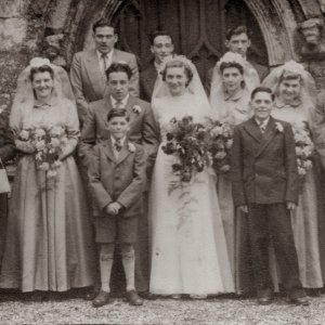 The wedding of Dennis Quirke and Joyce Clover, at St. Marys Church, Marshchapel - 6th. April 1953.
Back Row - L to R; Harold, Eddy and John Quirke, "Denniss brothers".
Front Row - L to R; Dorothy Clover "mother of the bride", Betty Clover "sister of the bride", Groom and Bride, Desiree Clover "sister of the bride",
Pam Whitehead, Bill Clover "father of the bride", and at the very front, Trevor and Bryan Clover "brothers of the bride".
