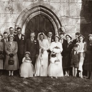 The wedding of Raymond Jacklin and Desiree Clover, at St. Marys Church, Marshchapel - 28th. March 1957.
L to R; Rita Jacklin, Hubert Jacklin "at the back wearing glasses", Trevor Wilkinson "Best Man", Bill Clover "to the right of the bride",
Jean Lovatt "bridesmaid", Cliff Clarke, Dorothy Clover, Brian Clover, Betty Clarke with son Bryn, Joyce Quirke, Dennis Quirke holding son Bryndley, Trevor Clover.
The two small bridesmaids are Malvyne Quirke and Beverley Ireland.