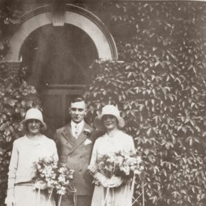 On the left is Amelia "Millie" Younger, "later Millie Deamer", acting as bridesmaid at a wedding in the 1920s.
